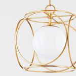 Side profile showing the circular arrangement of gold metal rings around the white glass globe