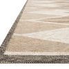 Side-on view highlighting rug edge with layered borders in taupe and gray tones