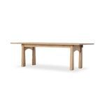 Flat lay photo of tabletop showing natural pine wood knots and grain