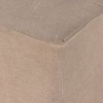 Low front angle of bench showing slipcover fitting near base and seat