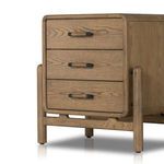 Straight-on front with clear view of all drawer handles and cradle base