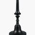 Delfin End Table with round clear glass top and sculpted black iron base in a minimalist modern style