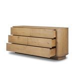 Three drawers partially open revealing dovetail joinery and spacious interiors
