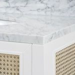 Close-up of marble countertop corner on Ariel 2-Door Cabinet with sink basin edge visible