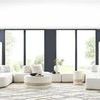 full Nest Modular Sectional styled in modern living room with large windows and neutral décor