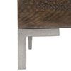 Close-up of gray mist finish steel leg and corner of distressed wood with visible grain and texture