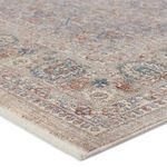 Close-up of rug corner showing detailed floral pattern with visible texture and soft pile