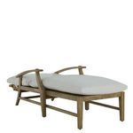 Side view of teak chaise with white cushion fully covering seating surface