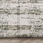 Perth Wool Blend Area Rug with hand-carded wool showing pillowy, textured surface and classic stripes in distressed plaid ...