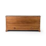 Back of sideboard showing warm pine wood grain and cord management cutouts