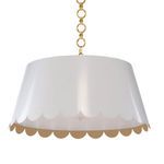 Mirasol pendant with white scalloped shade and gold scalloped interior, suspended by gold chain