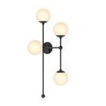 Armstrong 4 R Sconce illuminated showing warm light glowing through matte globes