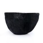 Front profile of smaller bowl emphasizing textured carbonized surface and curves