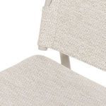 Detailed view of top section of backrest with fabric wrapping around aluminum frame