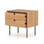Nightstand with two drawers partially open showcasing drawer interior and sliding mechanism