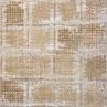 Rectangular area rug with a distressed block pattern in earth and sand tones, woven polypropylene and polyester blend