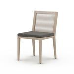 Three-quarter angled perspective of Sherwood Brown outdoor chair showing wood grain texture on frame