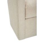 Close-up on bottom corner seam where armrest meets base