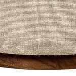 Close-up of wooden swivel base and fabric meeting on Sinclair Outdoor Ottoman