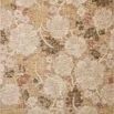 Botanical modern area rug with large floral pattern in natural beige, soft yellow, muted green, and rust tones