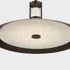 Close-up underneath view showing alabaster diffuser glowing softly with translucent clerestory light
