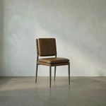 Industrial dining chair with steel gray powder coat frame and top-grain Ebony Black leather seat and back