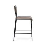 Side profile highlighting slim seat depth and metal footrest detail