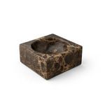 Square bowl angled to show thickness of marble sides and deep curved interior in warm brown tones