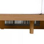 Close-up under the seat shows square teak wood legs supporting the Avalon Sofa with rope weave visible through frame.