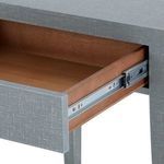 Opened drawer showing interior wooden finish and metal drawer slides