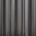 Close-up on graphite finish and fluted metal texture of the Kanti Accent Table side