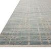 Close-up angled view showing fringed edges and low pile texture of Wade Spa Sand Rug