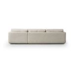 Back view showing smooth upholstery and continuous back panel of the sectional