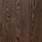Extreme close-up showing detailed grain of dark oak wood used for Torrington Bookcase shelving