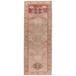 4x8 foot Southwestern rug with mini-medallions and geometric borders in orange, pink, beige, and brown