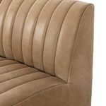 Close-up of seat and back cushions highlighting the distinct vertical leather channeling