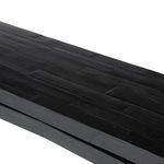 Close-up on the tabletop planks emphasizing wood grain and plank alignment