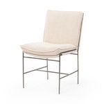 Armless dining chair with taupe high-performance fabric cushions and slender matte iron frame
