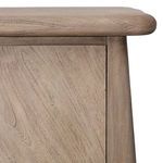Close-up of the top corner of Marci Sideboard highlighting sandblasted texture and rounded edge