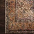 Corner section of Loren Plum Multi Rug showing detailed floral and geometric border on dark wood floor
