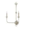 Wall sconce viewed from a side angle showing one arm curved outward and glowing candle-style bulb