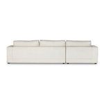 Back view of sectional revealing seam lines and cushions from rear