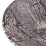 Close-up of multi-tonal swirling marble texture and polished edge of Lubo Breccia bowl