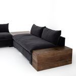 Grant sectional joined with wooden side table attachment in rich brown finish shown from an angled perspective