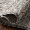 Rolled edge close-up highlighting the rug’s thickness and detailed woven texture