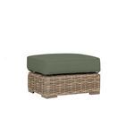Outdoor Havana Ottoman with all-weather woven wicker base in aged tobacco and green cushioned top