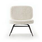 Front view of Caleb Small Ivory Angora Accent Chair with black metal legs against white background