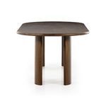 End view emphasizing rounded tabletop edges and solid arched legs