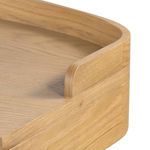 Curved backboard edge detail emphasizing craftsmanship of Armstrong Desk