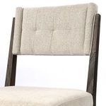 Back view showing simple upholstered panel with visible wood frame edges